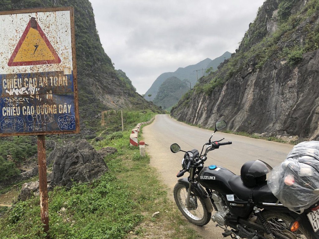 A motorbike on the side of the road along the Ha Giang Motorbike Loop in Vietnam