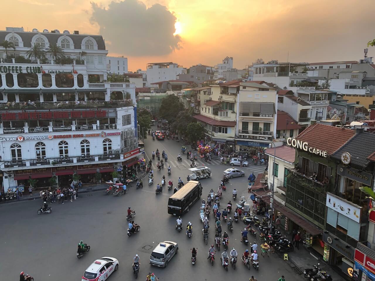 intersection in hanoi at sunset