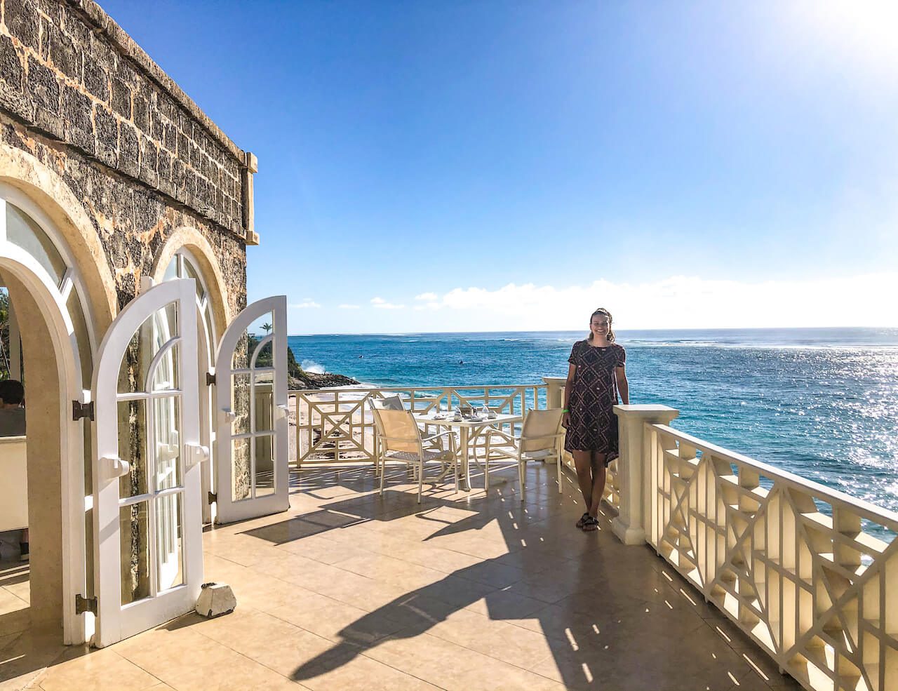 nicola stands on a balcony at the crane resort in barbados