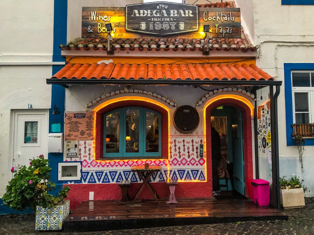 Colorful Adega Bar on a rainy day