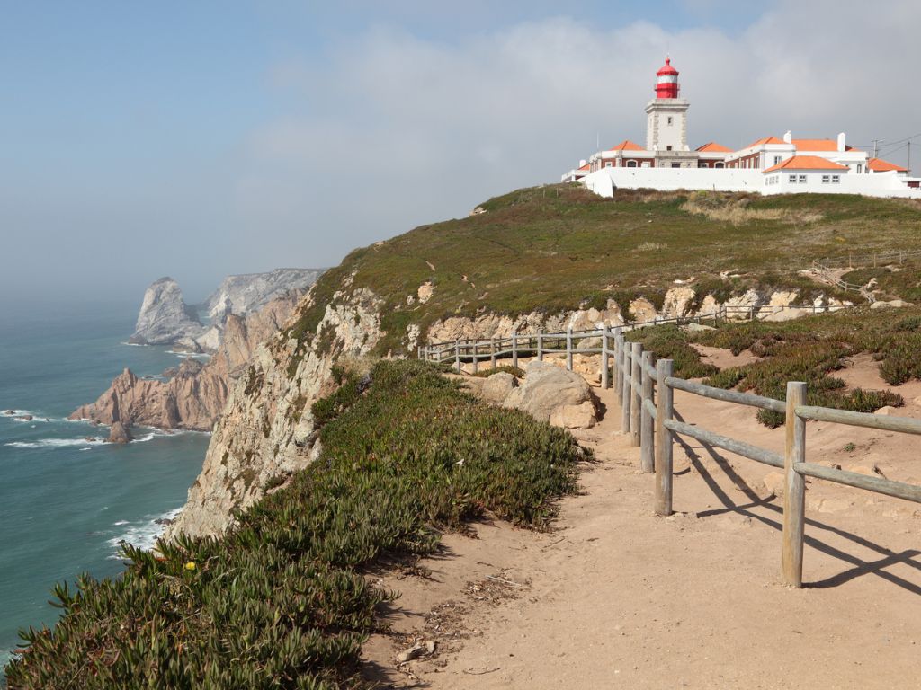 The lighthouse at Cabo da Roca with cliffs in the background