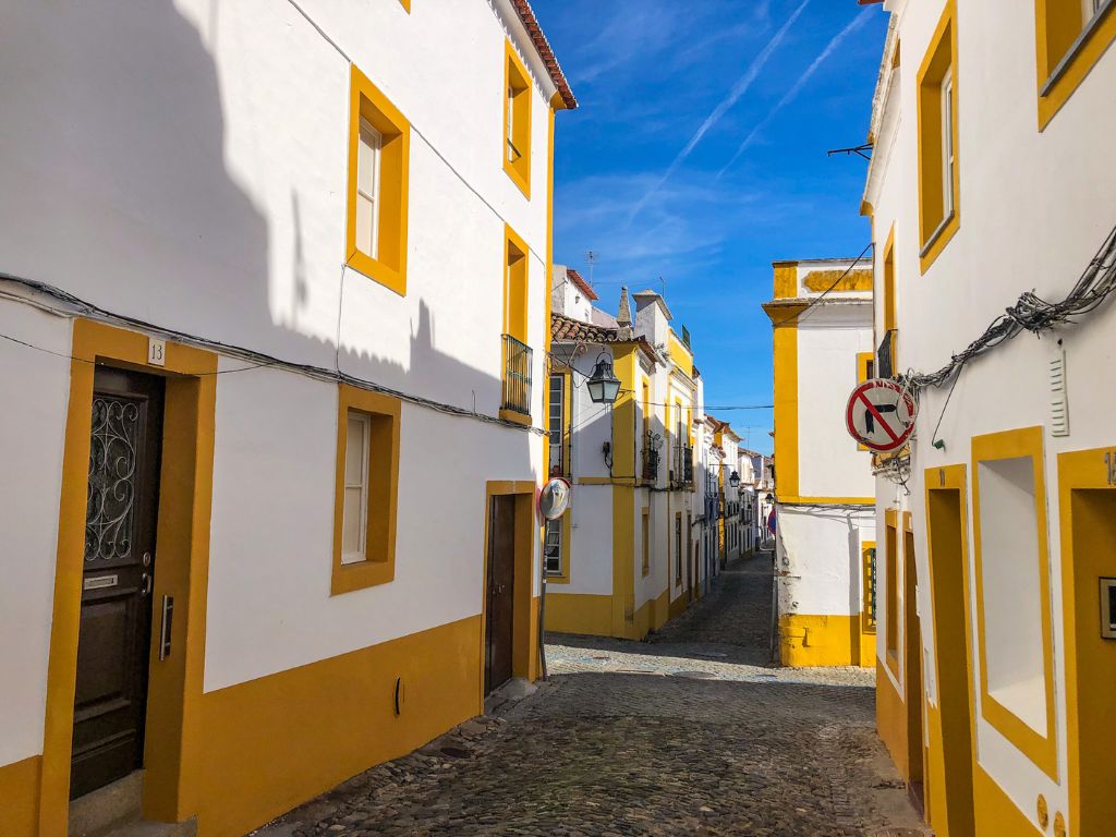 Yellow and white walls in the city of Evora Portugal